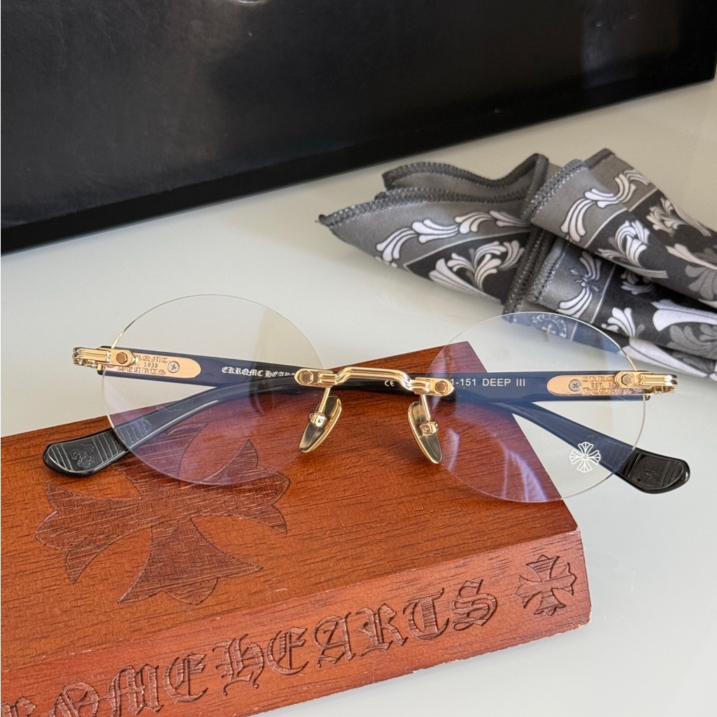 Chrome Hearts Gold And Black Rimless Eyewear